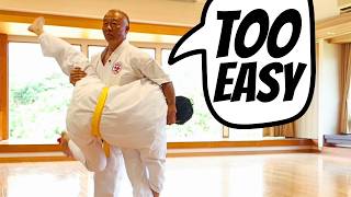60-Year-Old Karate Master Lifts Up An Adult Like A Baby