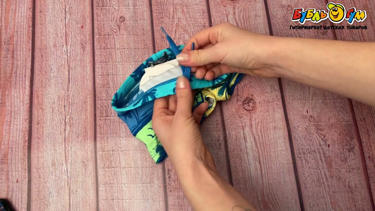 Плавки-боксеры Lanson Kids купальные с пальмами зелено-голубые - видео