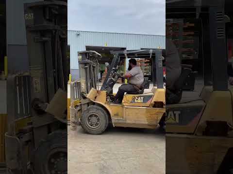 Rolling Up Dozer Tracks For Transport