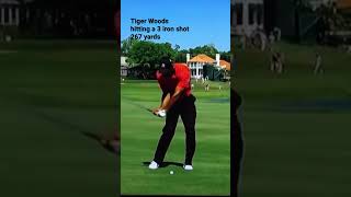 Tiger Woods hitting a 3 iron shot 267 yards