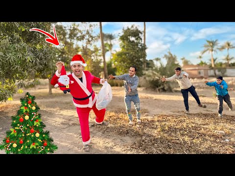 ‏كشري سرق الهدايا ولبس بابا نويل 🎅 ‏وزع الهدية للأطفال في الشارع 😂 عمر الزير