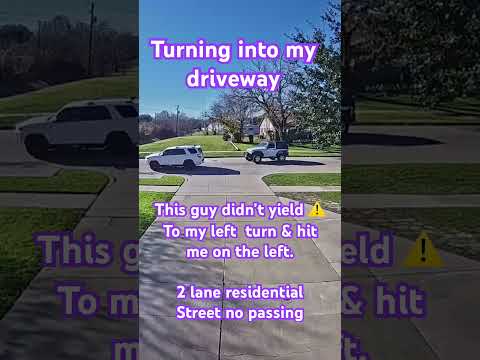 Jeep driver turns into his own driveway on a 2 lane residential street got overtaken by passing SUV