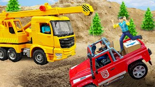 Toy Construction Vehicles: Crane Rescues Jeep Falling Into Hole
