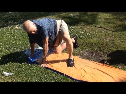 GRANDPA HITS THE SLIP 'N SLIDE!