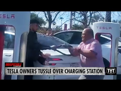 WATCH: Tesla Drivers TUSSLE Over Charging Station