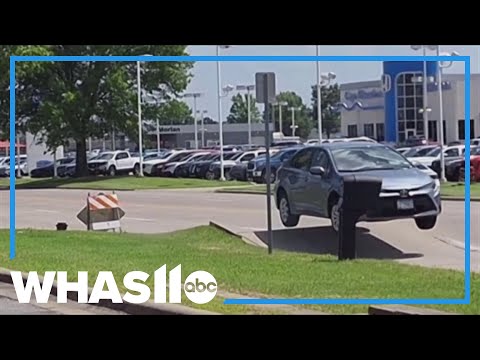 YouTube video thumbnail: Car Goes Airborne After Road Buckles in Missouri Heat