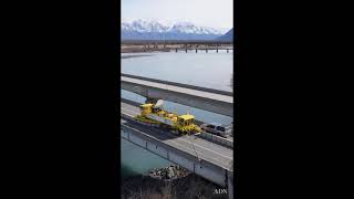 Road Zipper reconfigures lanes on Glenn Highway Knik River bridge