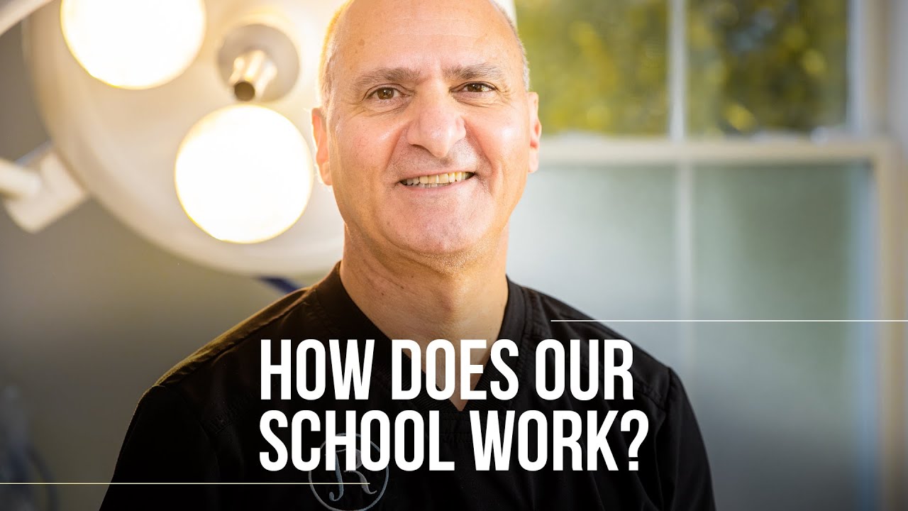 Smiling man in a medical setting explaining education.