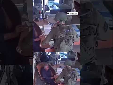 IOF soldiers storm a Palestinian taxi office