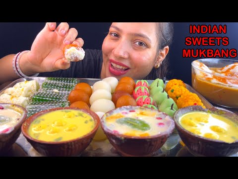 Eating Malai Roll, GulabJamun, Chena Pies, Fruit Rabri, Paan Petha, Rasgulla, Jodhpuri Ladoo, Idli