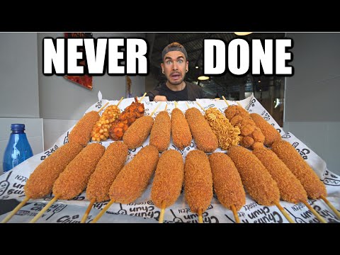 "BET YOU CAN'T EAT HALF" MASSIVE 10LB CORN DOG EATING CHALLENGE (Korean Rice Dogs)
