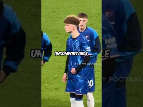 Cole Palmer and tall mascot