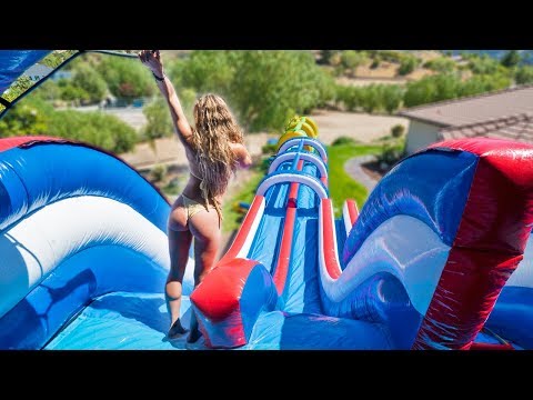 WORLD'S LARGEST BACKYARD WATERSLIDE! (100ft+)
