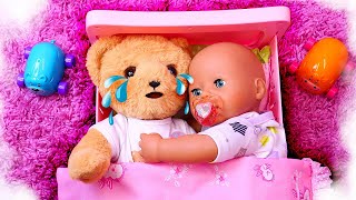 Baby Annabell doll is crying! Let's unbox a present for her and make friends with a toy bear.
