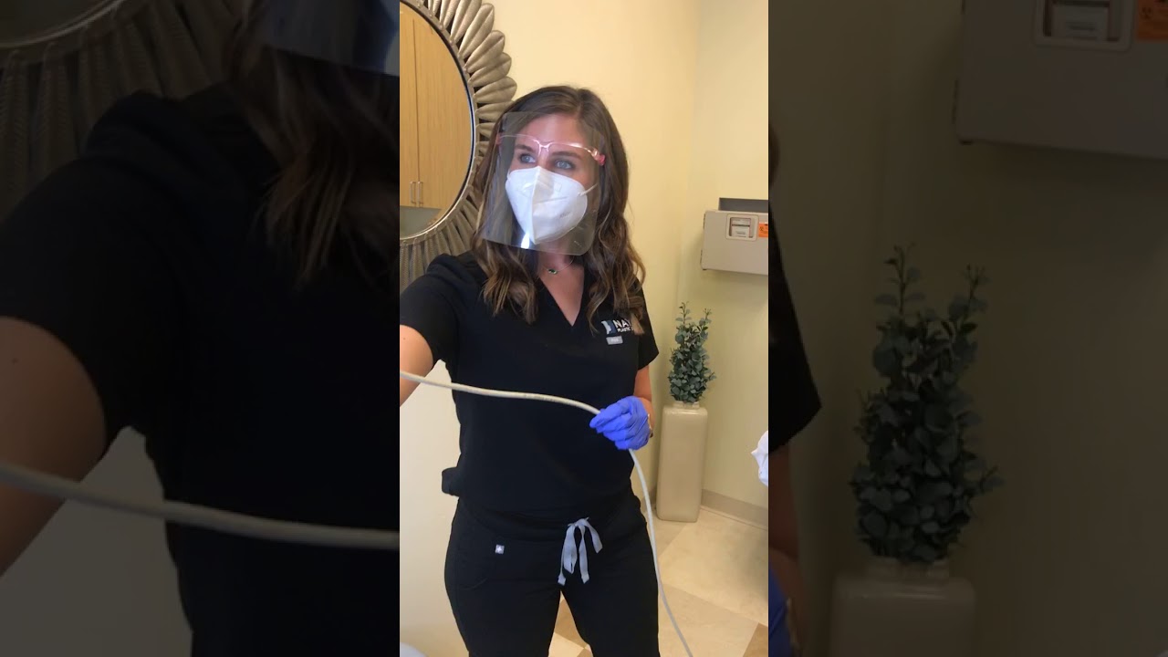 Healthcare worker preparing for a procedure.