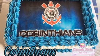 Confeitando bolo Corinthians
