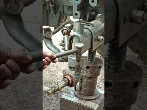 Opening the broken axle of the front wheel of the tractor #automobile #mechanic #agriculture