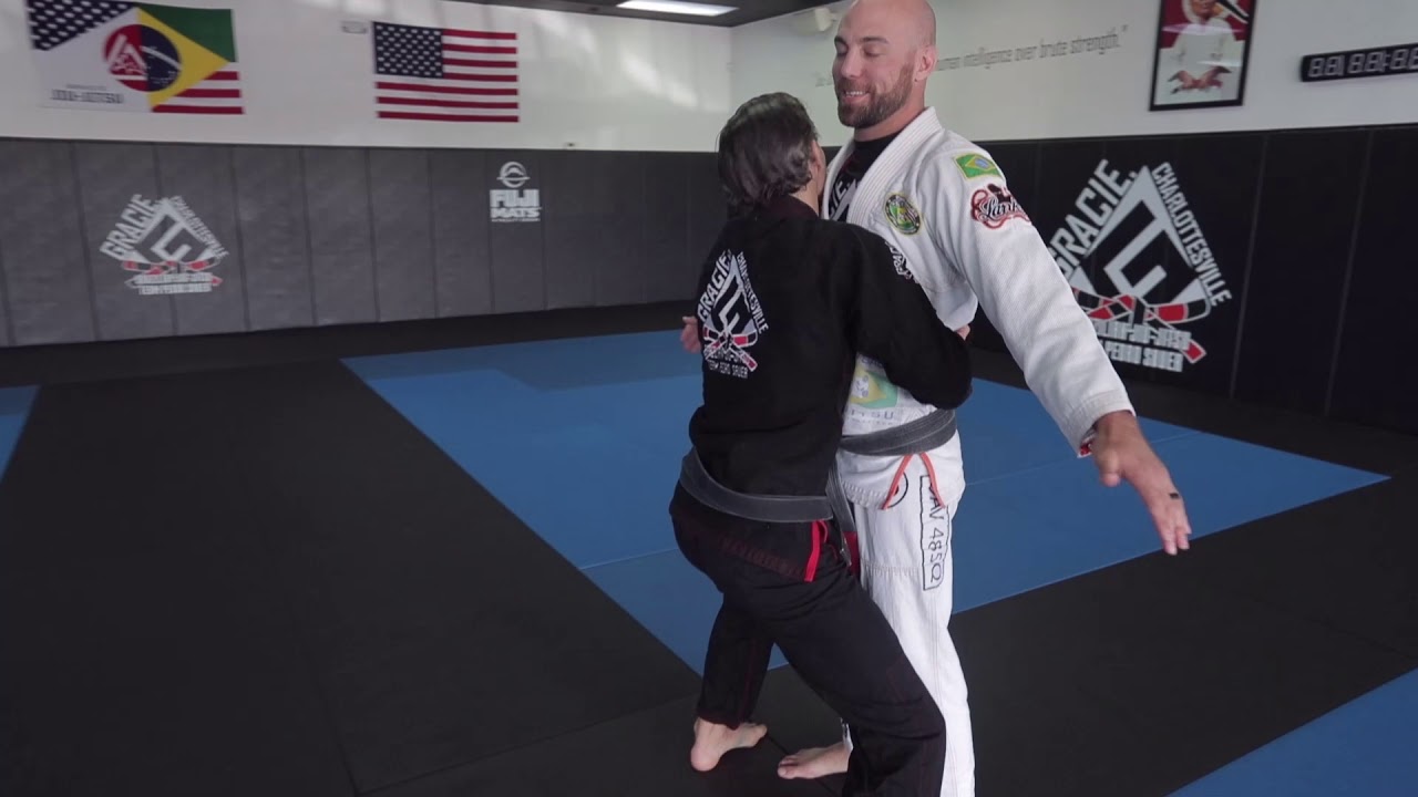 Front bear hug under the arms defense (with chin push)