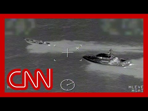 Video shows migrant smugglers trying to evade US officials on boat
