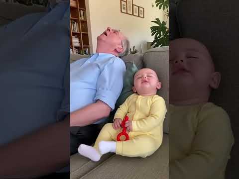 Baby Can't Stop Laughing at Grandpa's Snoring
