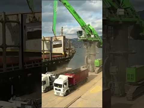 Unloading Cargo Ship with Excavator Crane