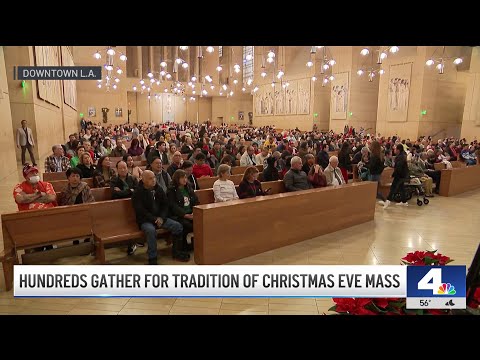 Hundreds gather for evening Christmas Eve mass in downtown LA