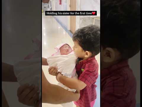 Holding his baby sister for first time❤️ #shortvideo #shorts #short #care