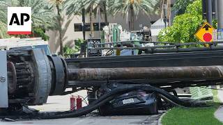 YouTube video thumbnail: 4 Hospitalized After a Crane Collapses at a Miami Construction Site