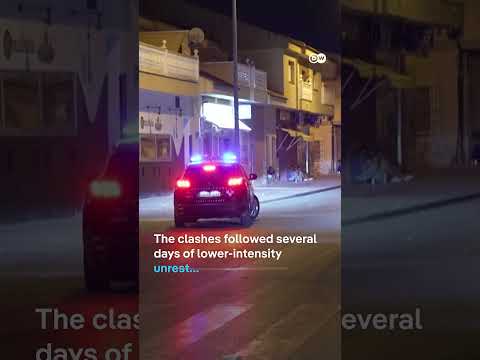 Spain: Police arrest 9 people after weekend clashes with anti-migrant groups | DW News
