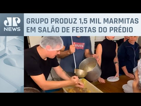 Moradores de condomínio se unem em cozinha solidária no RS