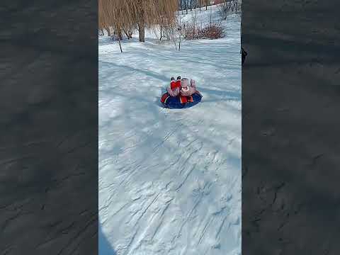 Liza jumps on the snow tramplin Gomel Belarus