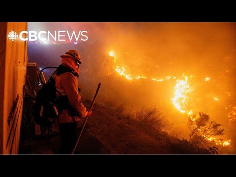 Malibu wildfire remained uncontained, but winds are calming, authorities say