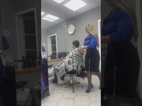 Beautiful Barberette Giving Haircut