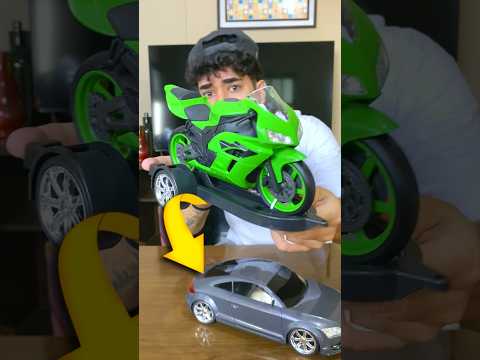 CARRINHO COM MOTO VERDE NA CARRETINHA