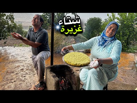 هطول شتاء غزيرة في قريتنا و إعداد حرشة بلدية على الحطب
