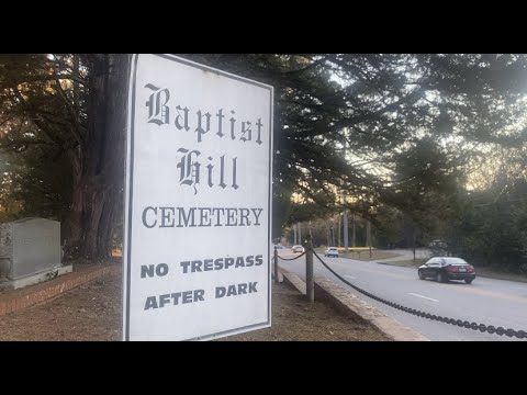 Community members come together to clean historic cemetery