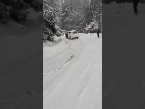 Car slide out of control on icy road