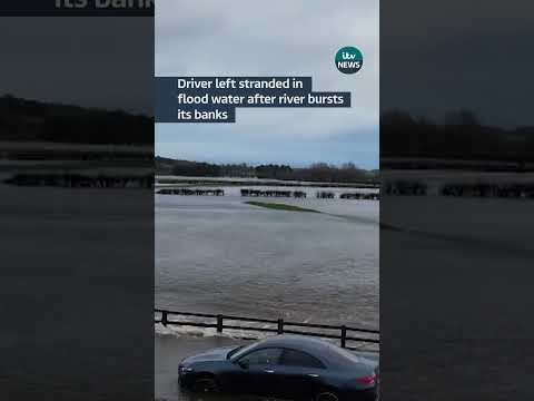 Driver left stranded in floodwater on New Year’s Day #itvnews #weather