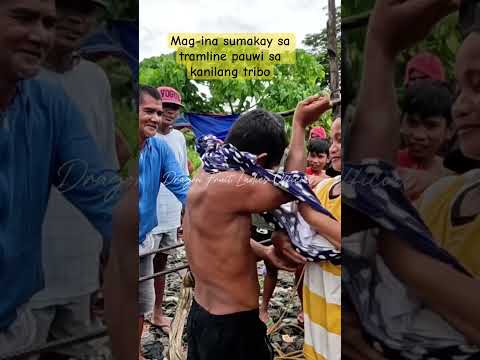 Buwis buhay na pagtawid Mag-ina sumakay sa tramline pauwi sa kanilang tribo #viralvideo
