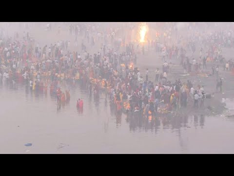 India's Hindus bathe in holy river defiled by pollution | AFP