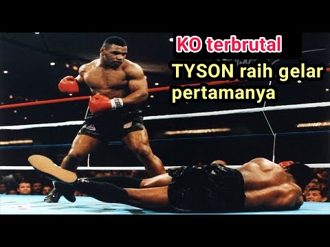 Mike Tyson meraih gelar juara Dunia pertamanya , salah satu KO terbrutal Tyson.