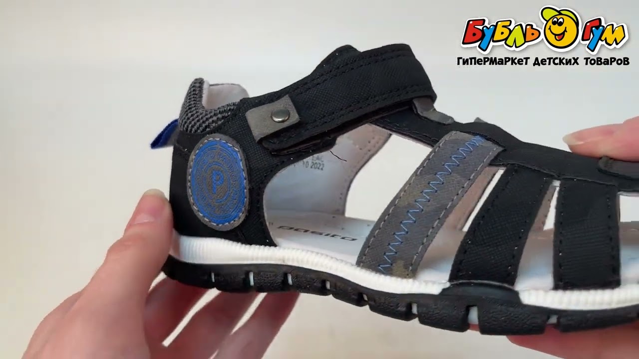 Сандалии Pasito с голубыми вставками и строчкой с круглой эмблемой черные  - видео