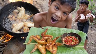 Survival in the rainforest - Cooking chicken wing recipe in forest and eating | Primitive Boy