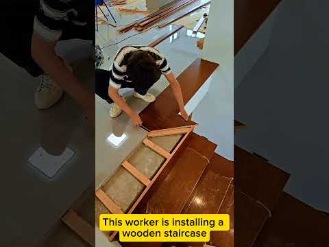 This worker is installing a wooden staircase#workers #build