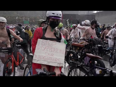 YouTube video thumbnail: Portlanders Hold Nude Bike Protest Over National Guard Deployment 
