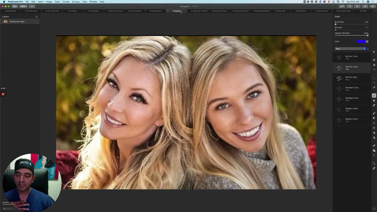 Two women smiling together outdoors.