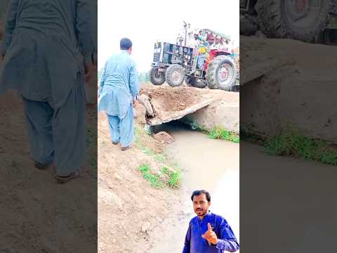 385 Tractor-trolley load overturns over mud bridge | #short #ytshort #shortvideo