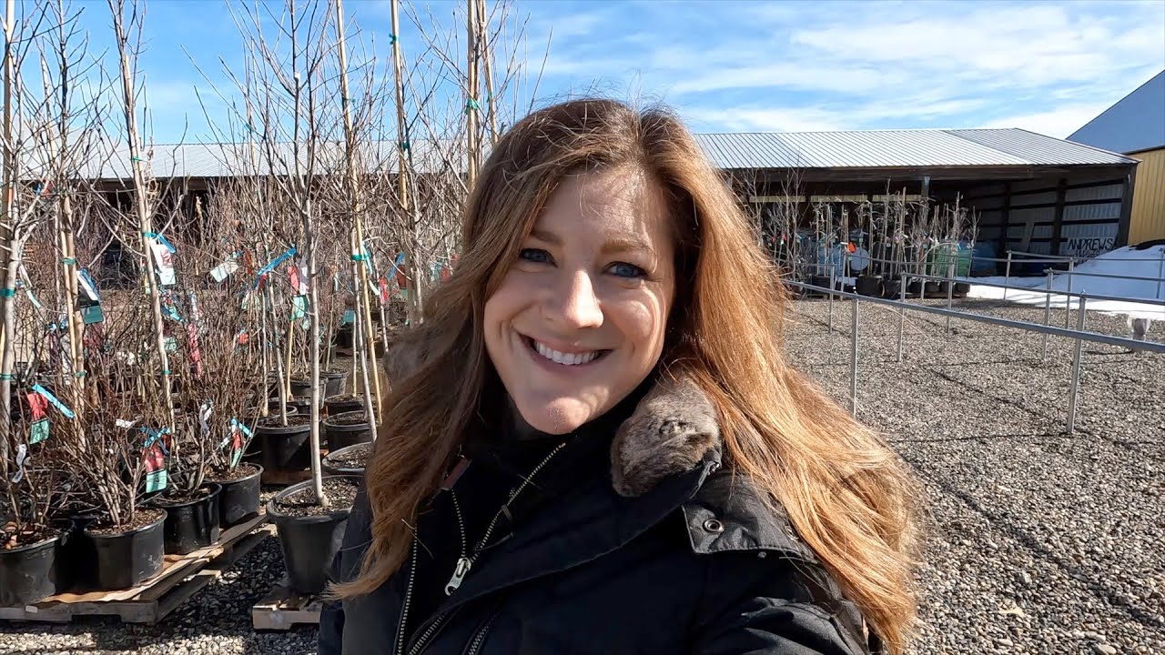 Helping Unload a Huge Load of Trees at the Garden Center!