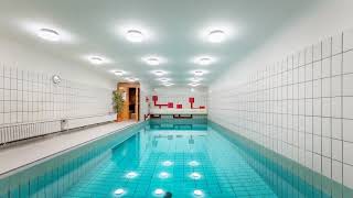 Attraktive Hochparterre-Wohnung mit Sonnenterrasse und zwei Stellplätzen in ruhiger grüner Lage