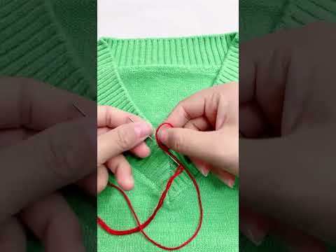 Loose stitching at the neckline